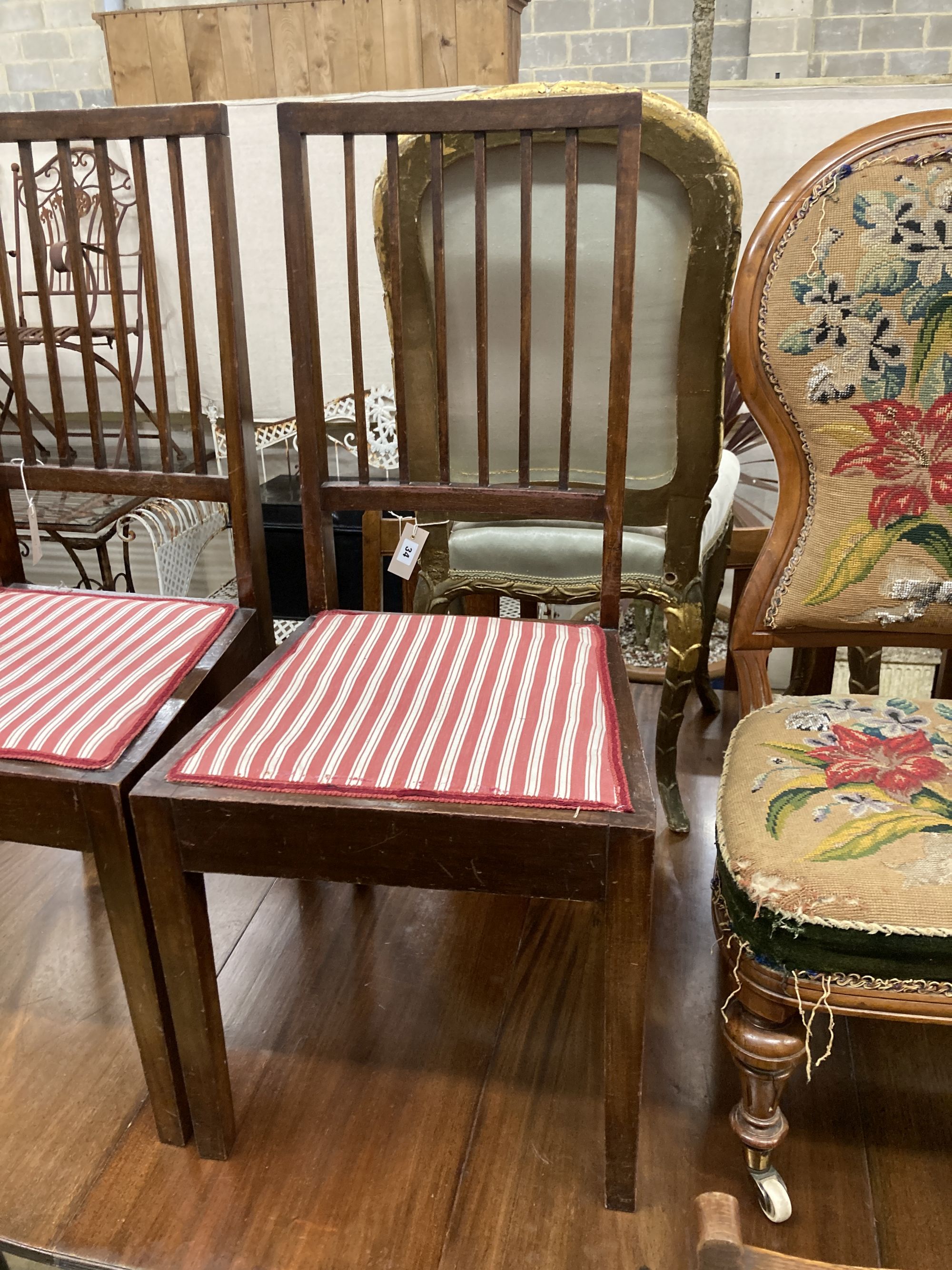 A pair of mahogany bedroom chairs, labelled Beard Watson, Sydney